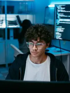 a man searching cloud on laptop